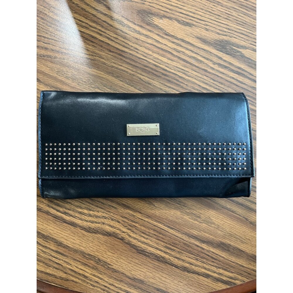 BCBG Paris black clutch bag with gold tone dots